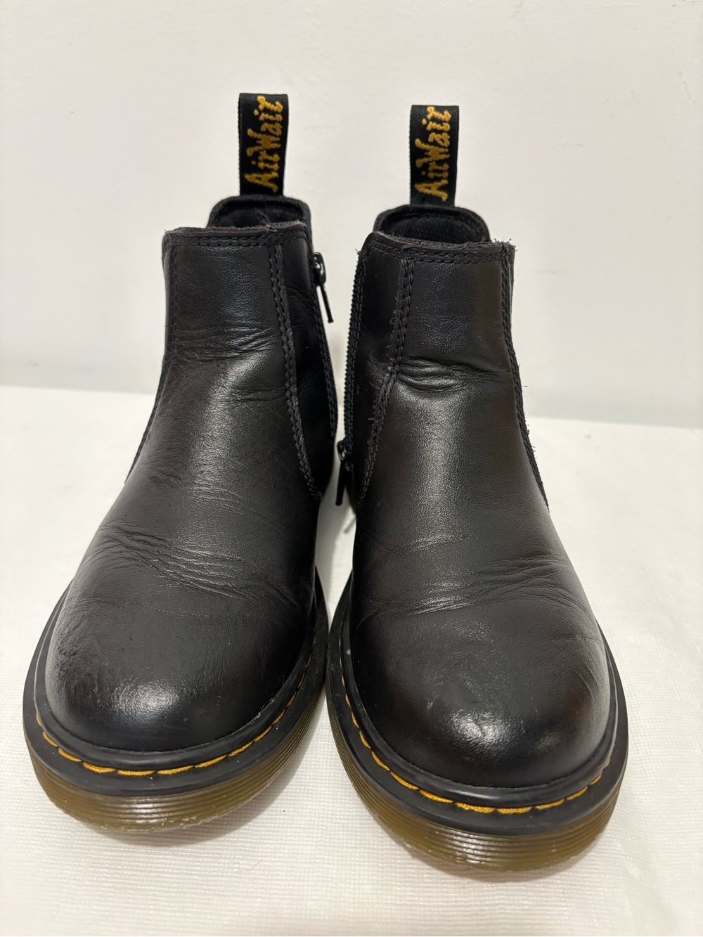 Dr. Martens Black Leather Ankle Boots with Yellow Stitching